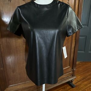 Black Dolce Cabo faux leather top with zipper in back!